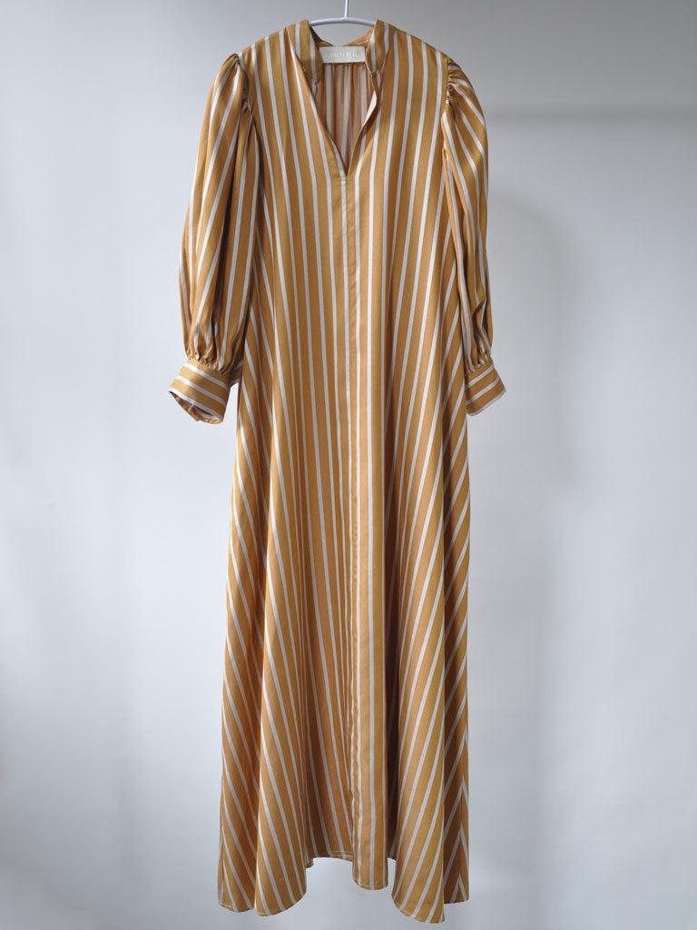 Front of Arona Dress in Ochre Stripes on a hanger