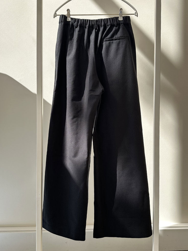 Classic black bouclé trousers with wide straight legs and elastic back waistband – SARA BOUCLÉ PANTS