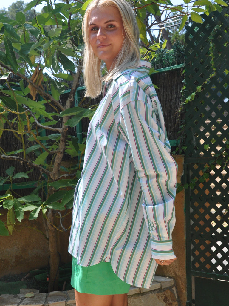 Side of Ana shirt in green stripes