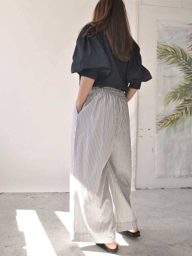 Back of Elisa pants in grey stripes