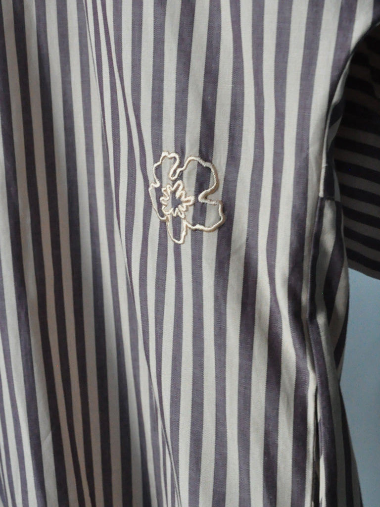 Detail Closeup of Striped Shirt Dress with Embroidered Flower