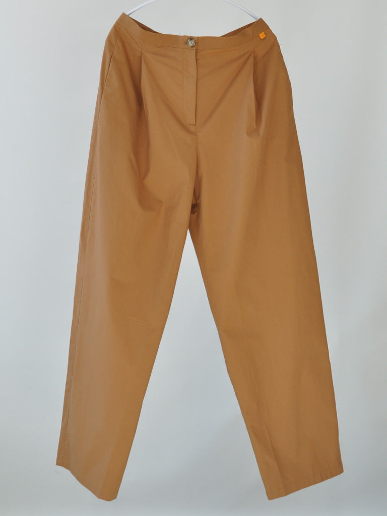 Front of Studio Pleats Pants in Camel