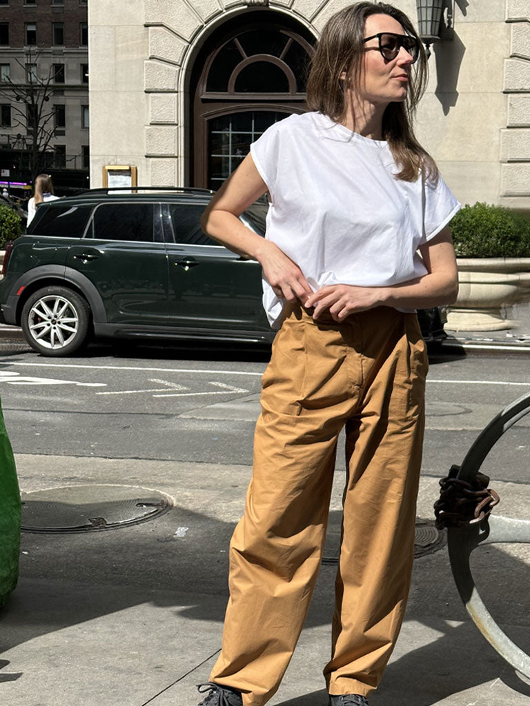 Front of Studio Pleats Pants in Camel