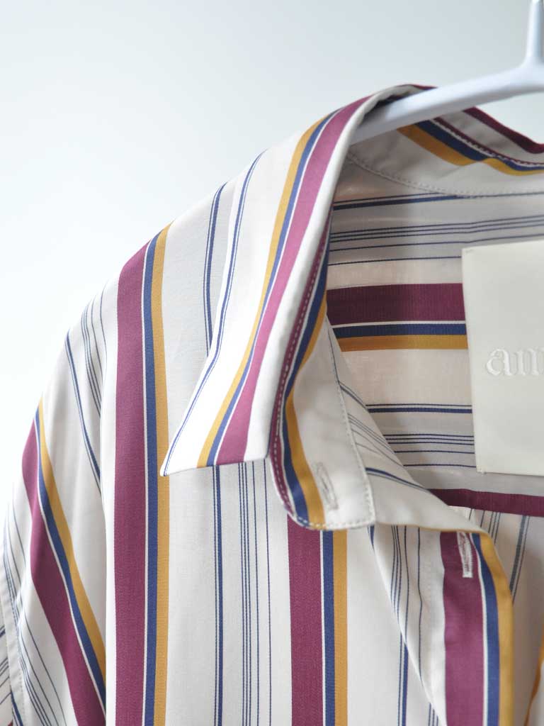 Collar Closeup of Ana Sat Shirt in Magenta Stripes on a hanger