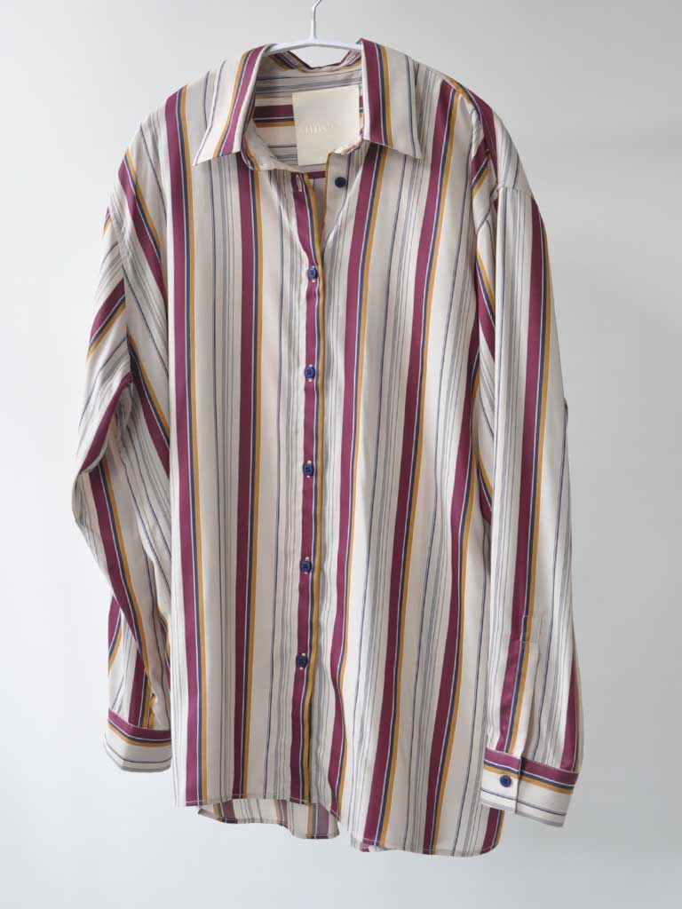 Front of Ana Sat Shirt in Magenta Stripes on a hanger