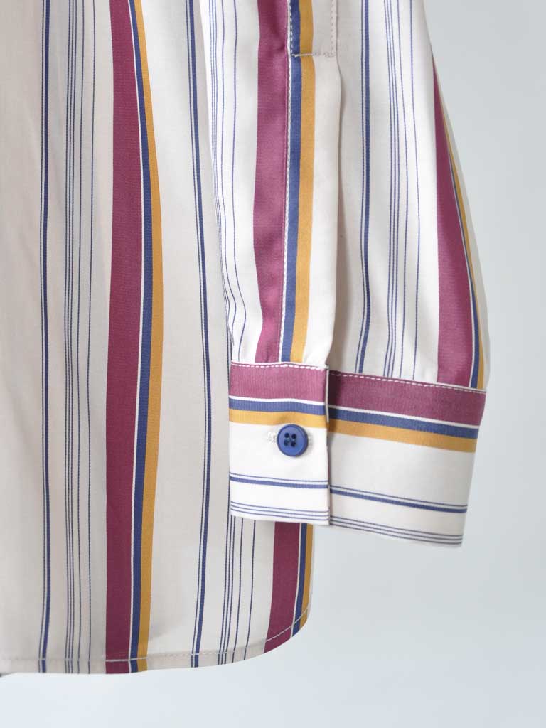 Sleeve Closeup of Ana Sat Shirt in Magenta Stripes on a hanger