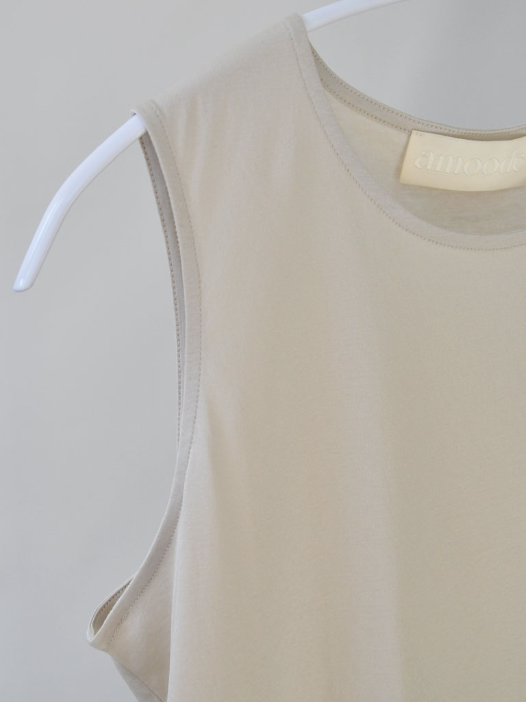 Sleeve Closeup of Aniset Top in Soft Beige on a hanger