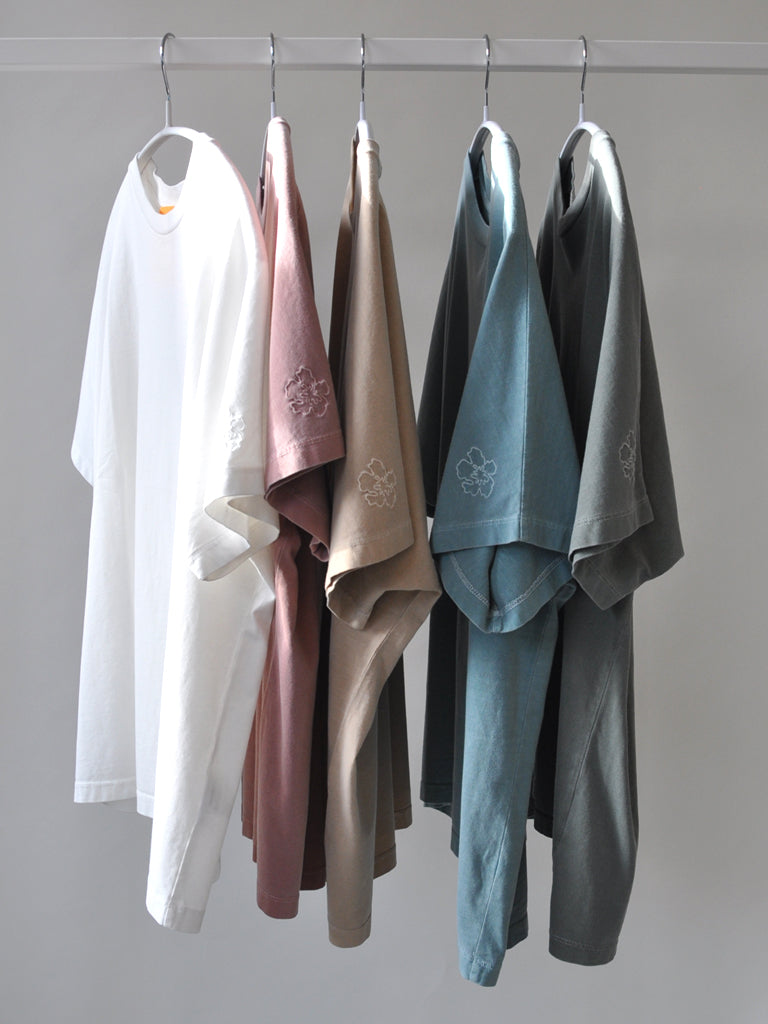 Different Avio tee on a rack in different colour variants