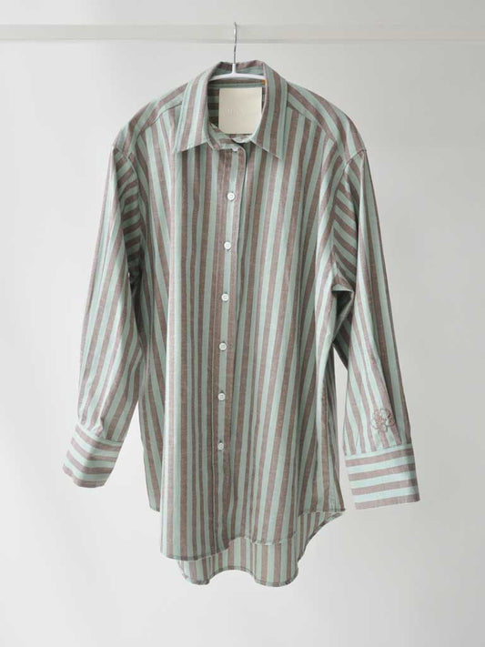 Front of Bea Shirt in Pistachio Stripes on a hanger