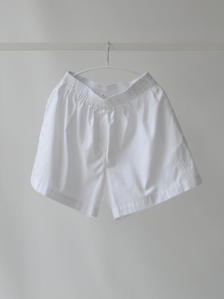 Front of Belize Boxers in White on a hanger