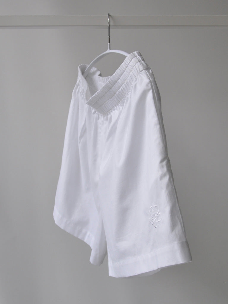 Side of Belize Boxers in White on a hanger