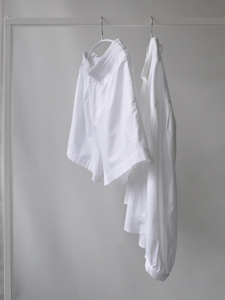 Front of Belize Boxers in White on a hanger