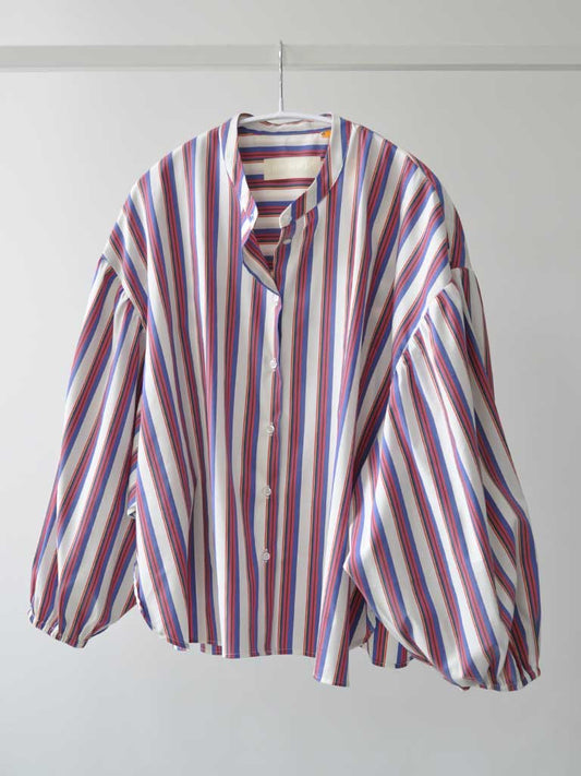 Front of Elli Shirt in Magenta Stripes on a hanger