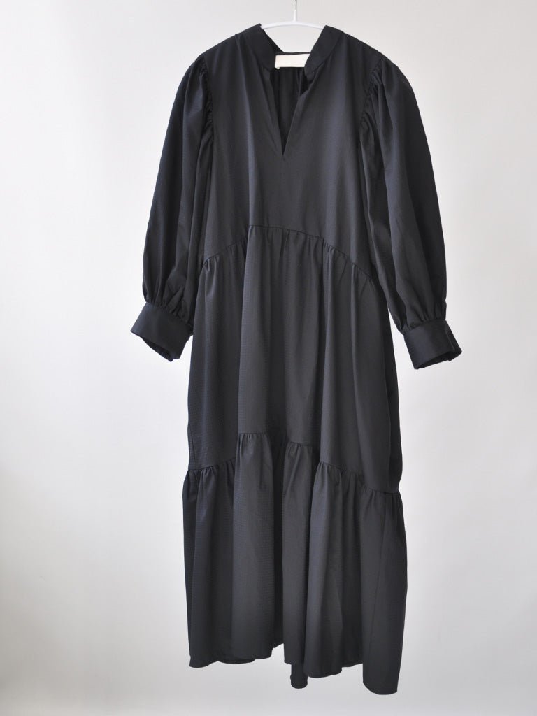 Front of Olivia Dress in Black on a hanger
