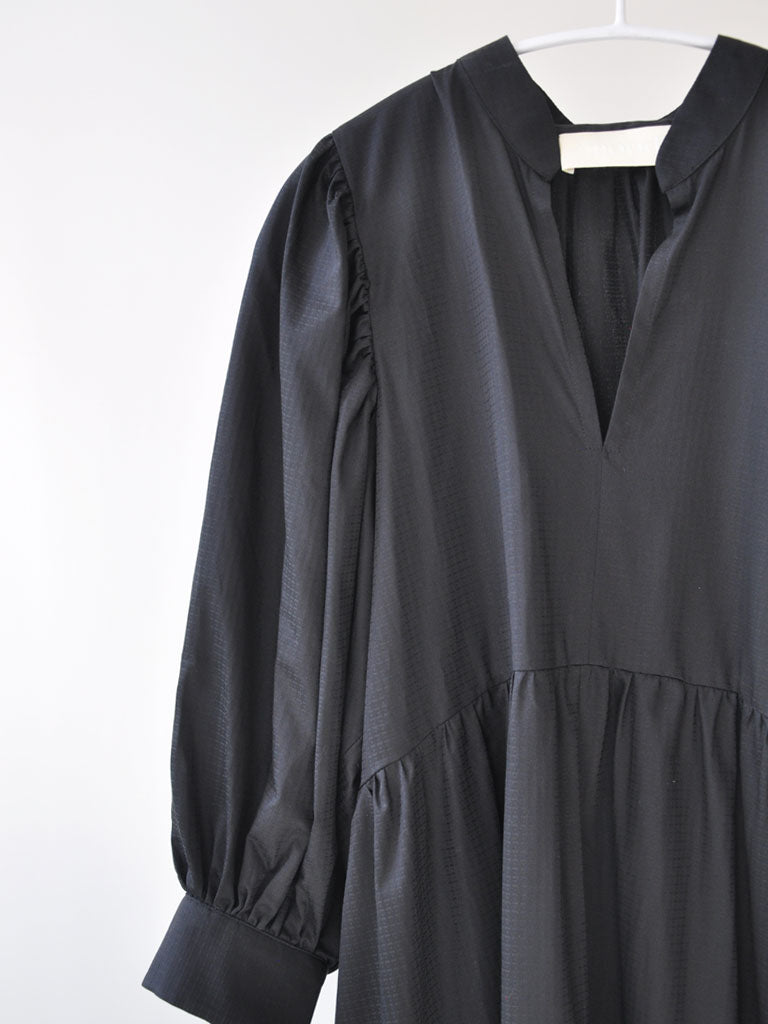 Front of Olivia Dress in Black on a hanger