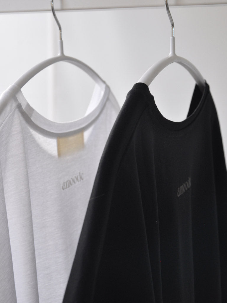 Back of Ovio Tee in White on a hanger