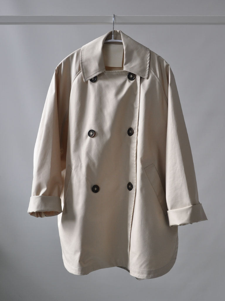 Front of Tea Trench Jacket in Beige on a hanger