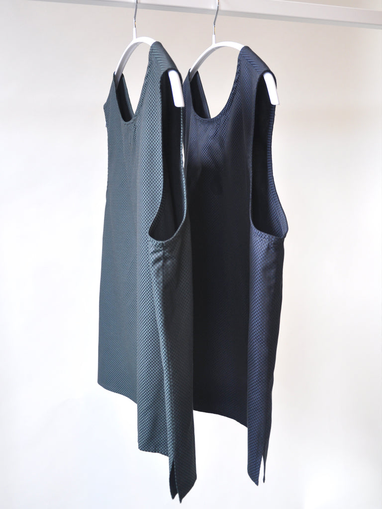 Aia top in colour variants black and green check, and black and blue check