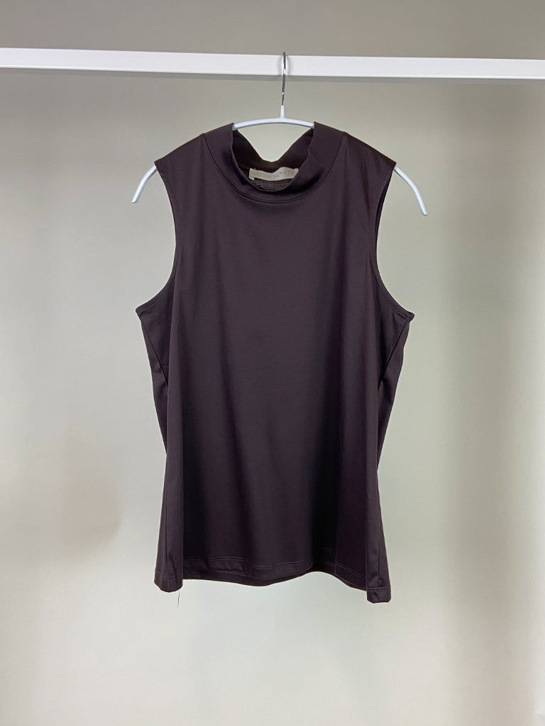 Alanis top in black on a hanger