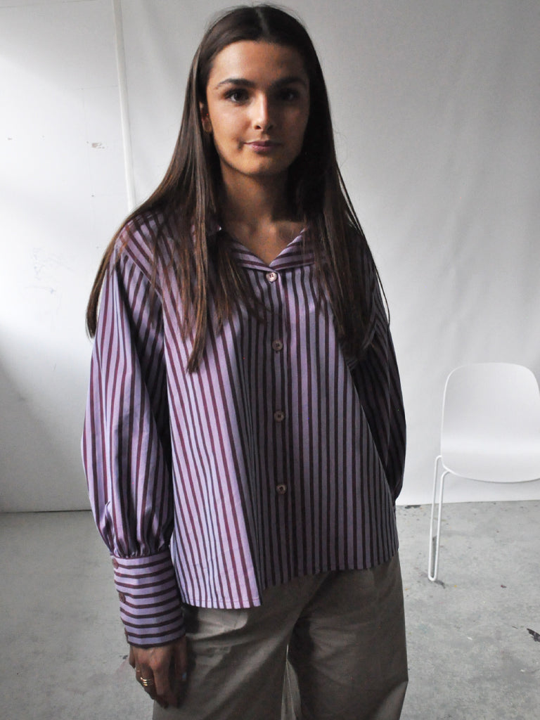 Front of Avena shirt in purple stripes