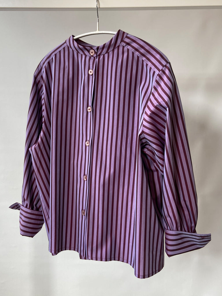 Front of Avena shirt in purple stripes