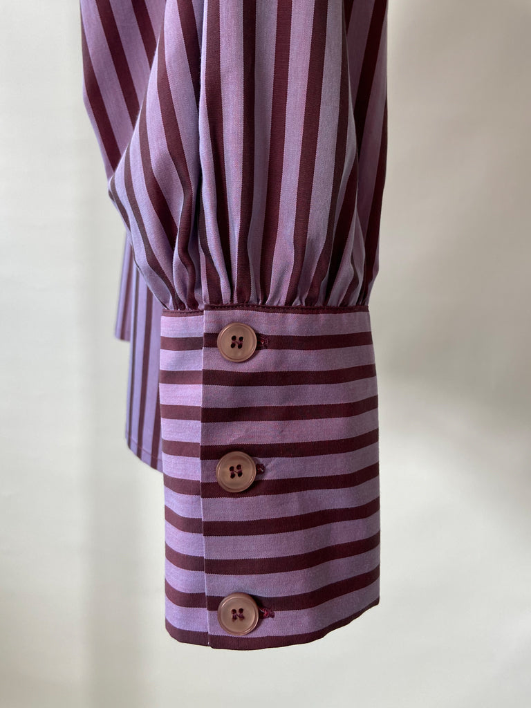 Sleeve closeup of Avena shirt in purple stripes