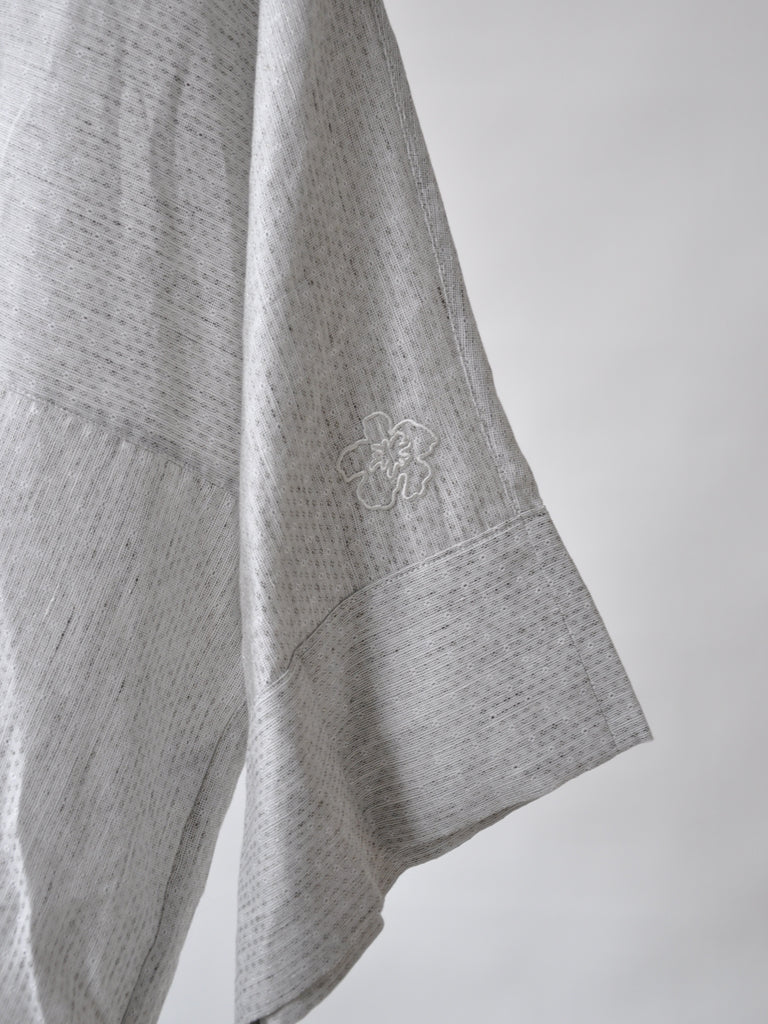 Sleeve closeup of Emma shirt in grey