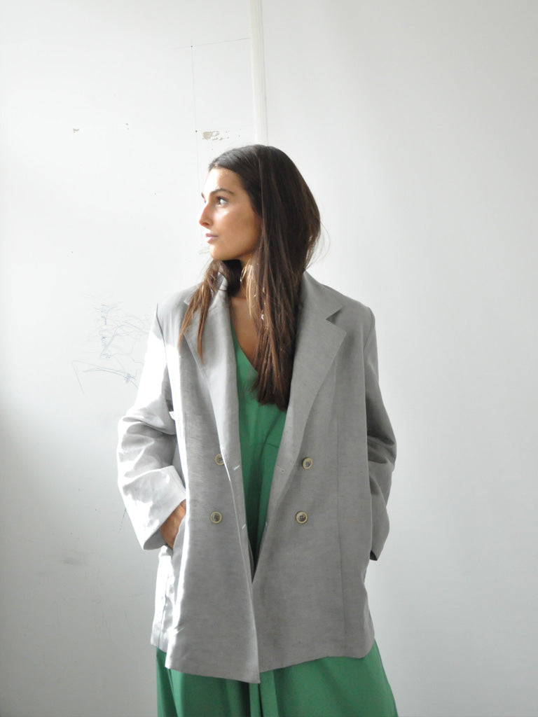 Front of Alexa Linen Blazer with Green Dress