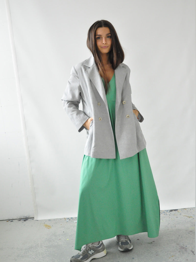 Front of Alexa Linen Blazer with Green Dress