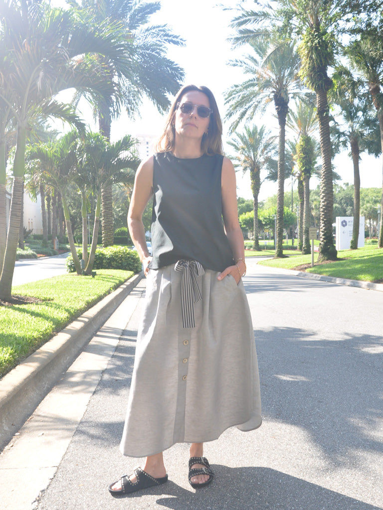 Front of Aia Top in Black and Green with Etna Linen Skirt