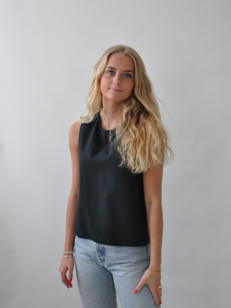 Front of Aia Top in Black and Green