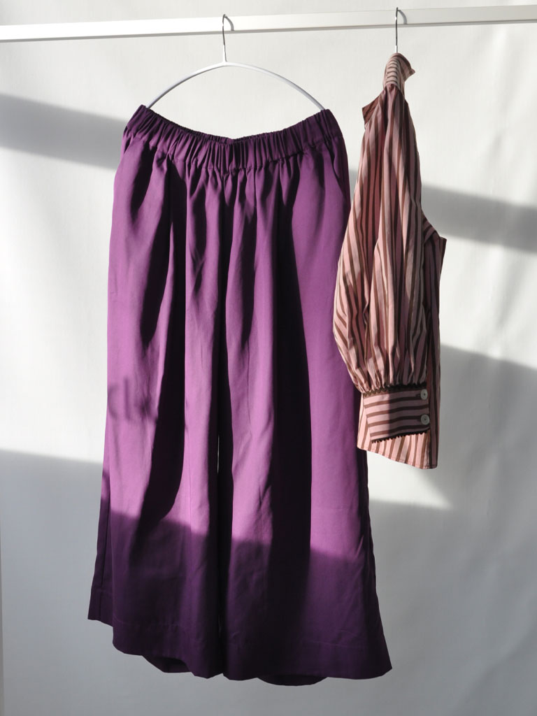 Front of Alea Pants in Purple Tencel on a hanger