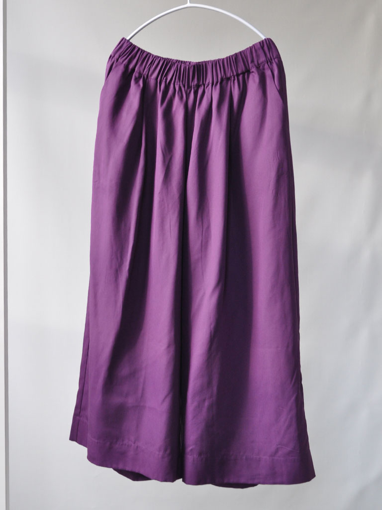 Front of Alea Pants in Purple Tencel on a hanger