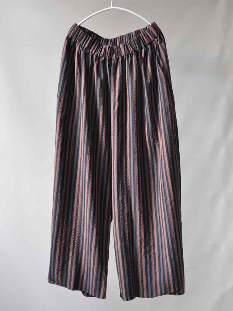 Front of Alea Pants in Tencel Stripes on a hanger