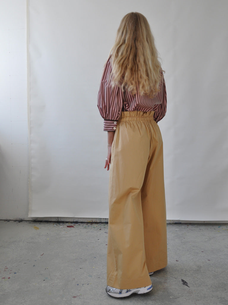 Back of Ami Pants in Camel