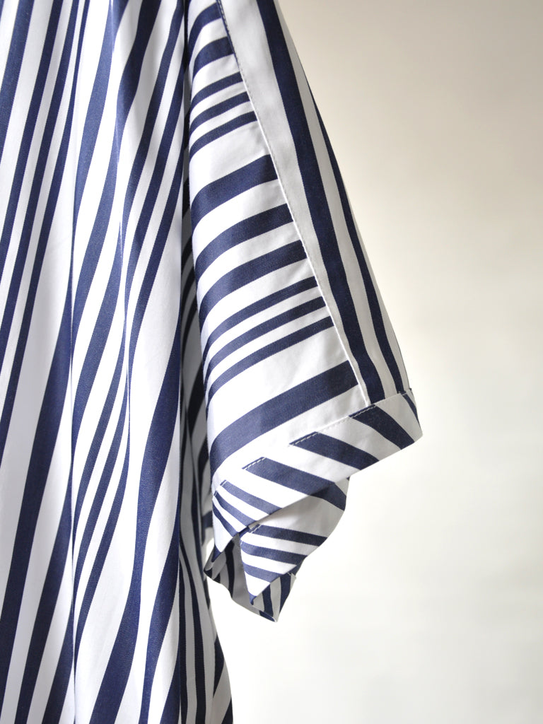 Sleeve closeup of Amisa kaftan dress in blue stripes