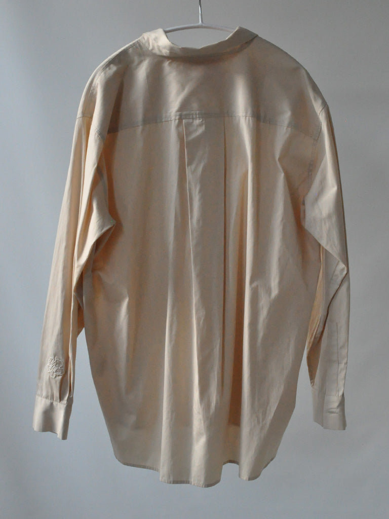 Back of Ana Shirt in Beige with Back Pleats