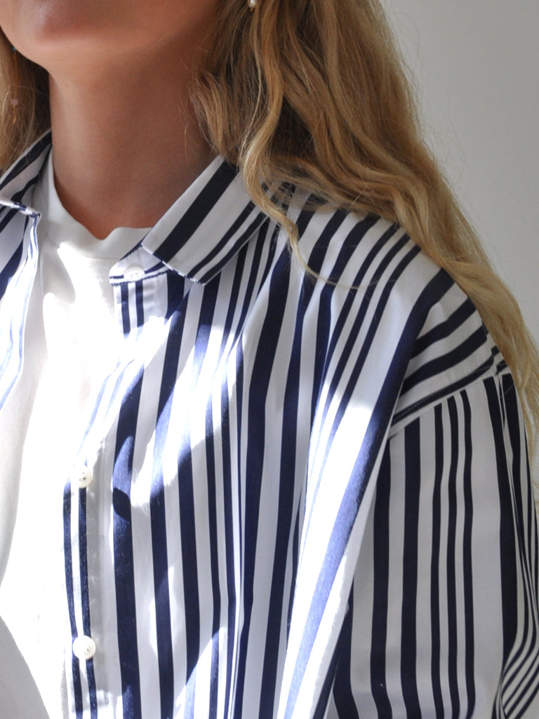Collar closeup of Ana shirt in blue stripes