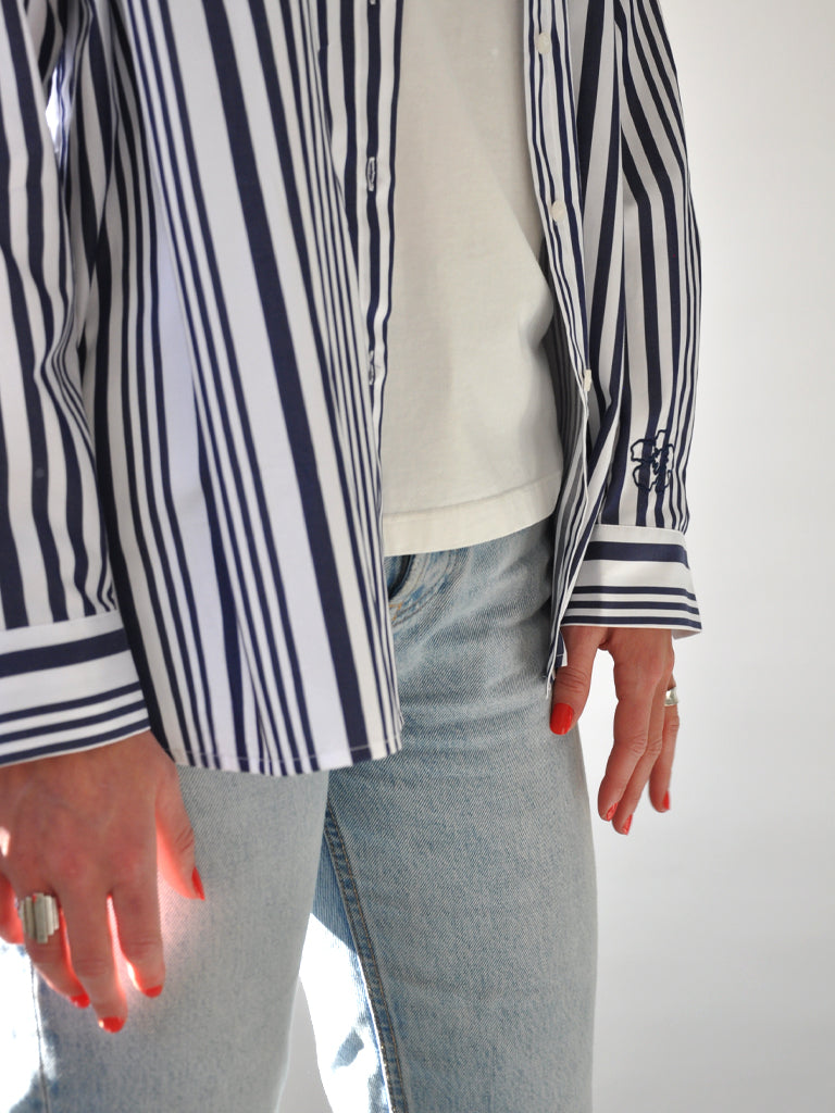 Sleeve closeup of Ana shirt in blue stripes