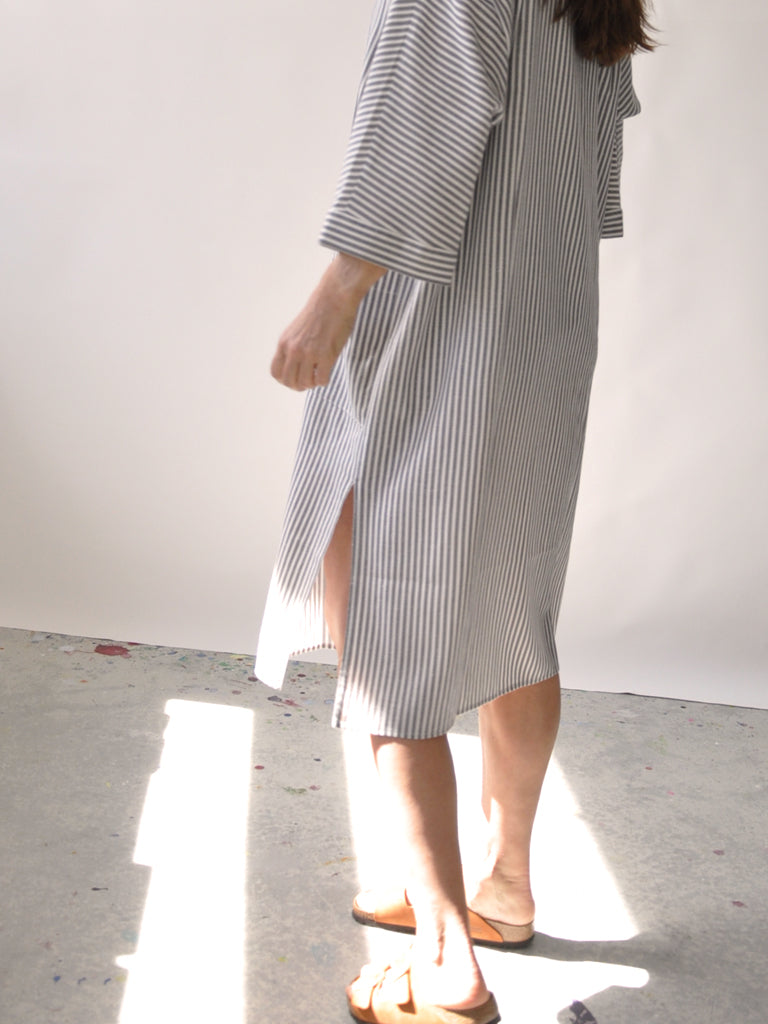 Back of Elisabeth kaftan dress in grey stripes