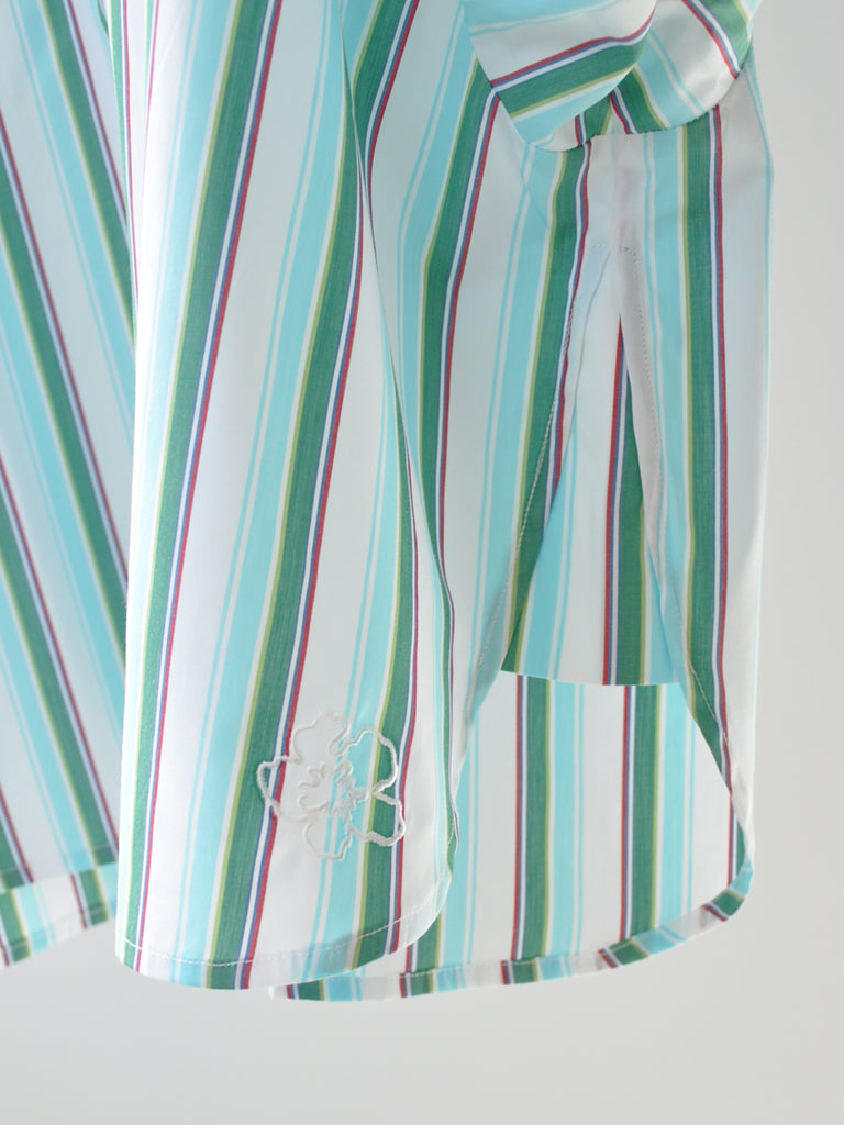 Sleeve closeup of Elli shirt in green stripes