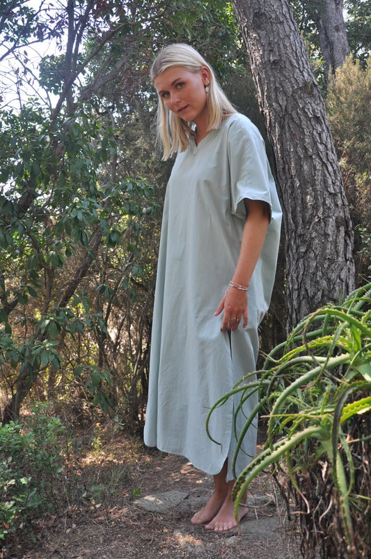 Fullbody shot of Amisa kaftan dress in teal