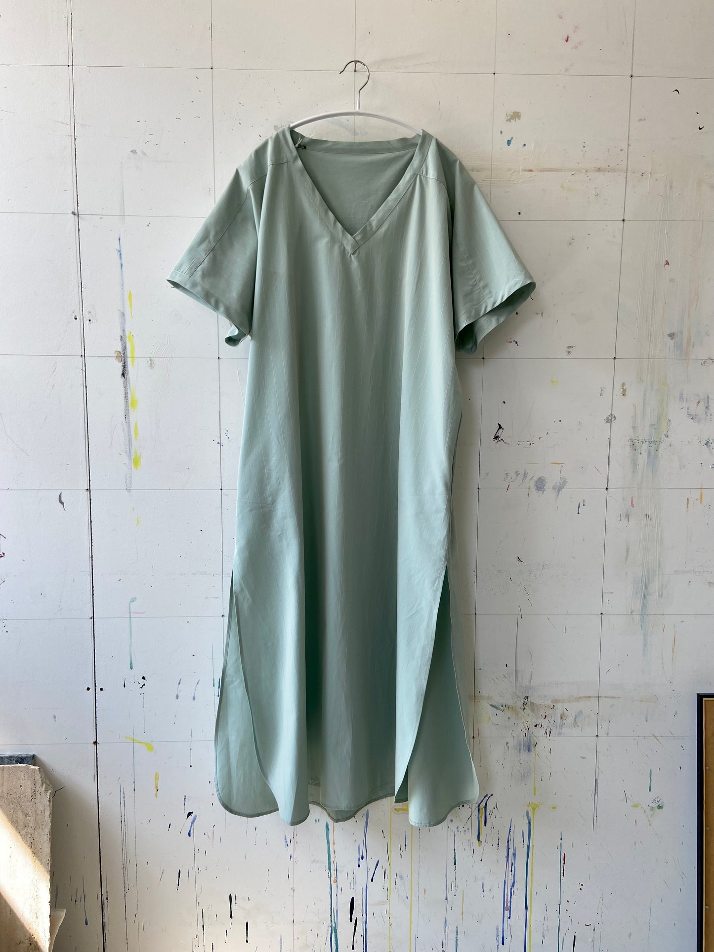 Front of Amisa kaftan dress in teal