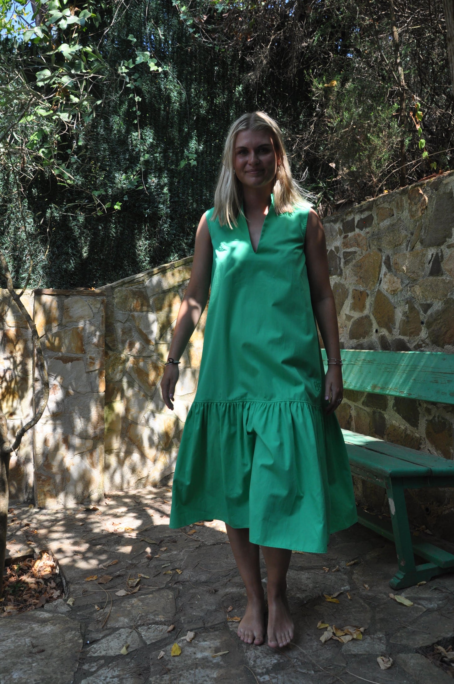 Front of green sleeveless dress